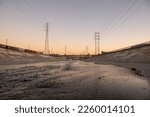 A Beautiful view of LA river with 6th street bridge against sunset