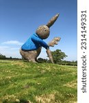 Small photo of CHESHIRE, GB - May 07, 2018: The Snugburys ice cream hay sculpture peter rabbit in Nantwich Cheshire