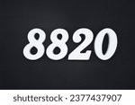 Small photo of Black for the background. The number 8820 is made of white painted wood.