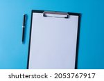 top view of blank paper on... | Shutterstock . vector #2053767917