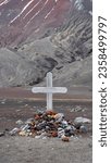 Small photo of Whaler's Bay, Deception Island, Antarctica - March 4, 2022: Cross at an old cemetery