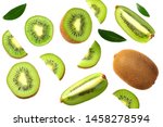 kiwi fruit with slices and green leaves isolated on a white background. top view