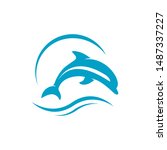 Waves And Jumping Dolphin Logo...