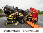 Small photo of Senov, Czech republic - september 11 2015: Firefighters and paramedics practice rescuing and extrication people from crashed vehicles