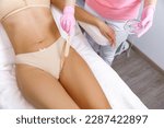 Small photo of Bikini waxing,Intimate waxing, Hair removal, bikini area. laser epilation on bikini. Rejuvenation Treatments in Cosmetic Beauty Clinics
