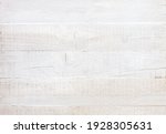 Small photo of Uncouth wooden board painted white. Grunge background. Old wooden shabby texture. Flat lay.