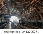 Small photo of JAKARTA, INDONESIA-JANUARY 2024 -Jabodebek LRT series enters Dukuh Atas LRT station on 16, January 2024 in Jakarta.