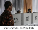 Small photo of TANGERANG, INDONESIA-FEBRUARY 2024 - Residents carry out voting simulations for the 2024 Election at local polling stations on 02, February 2024 in Tangerang.