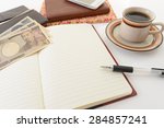 notebook and bills | Shutterstock . vector #284857241