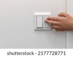 Switching Off the Light, Turning Off Light Switch. Saving concept. Copy space. 