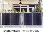 Small photo of Solar panels on Balcony of Apartment block. House Solar Power Panel. Modern Solar Balcony