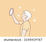 old lady looking in mirror.... | Shutterstock .eps vector #2145419767