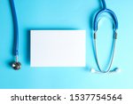 stethoscope and notepad on a... | Shutterstock . vector #1537754564