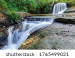 Small photo of CAROLINA, BRAZIL - CIRCA AUGUST, 2019: The Garrote Waterfall is one of the attractions of the Pedra Caida tourist complex, located in the Chapada das Mesas region, Carolina city, state of Maranhao