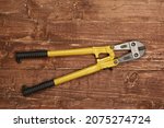 Big heavy duty bolt cutters.A pair of bolt cutters. The markings on the tool are specifications only. No visible brand names, copyright, logo or trademarks.