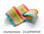 Small photo of marmalade candy in the form of a ribbon of rainbow colors. High quality photo