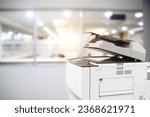 Small photo of Copier or photocopier or photocopy machine office equipment workplace for scanner or scanning document or printer for printing paperwork hard copy paper duplicate Xerox or service maintenance repair.
