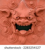 Small photo of Shisa lion statues of Okinawa are placed at the entrance and on the roof to ward off evil spirits.