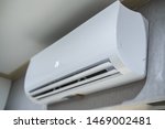 Inverter Air conditioner install on modern grey wall colors interior design for urban business office concept