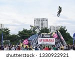 Small photo of Ho Chi Minh City/ Vietnam - Oct 4, 2016: Unknown racers are on performance at Yamaha Revs Your Heart Tour in Saigon. There are some heartthrob acts such as twist, flip. The event offer free access.