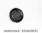 Small photo of A reliable black camera lens cap with a diameter of 52mm, designed to provide good protection for the camera front glass such as from dust, scratches and accidental damage.