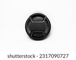 Small photo of A reliable black camera lens cap with a diameter of 52mm, designed to provide good protection for the camera front glass such as from dust, scratches and accidental damage.