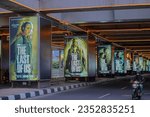 Small photo of South Jakarta, Indonesia - February 18, 2023: An advertisement for the Last of Us series is displayed on a pole beneath the Blok A Jakarta MRT station