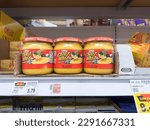 Small photo of Los Angeles, California, United States - 02-01-2023: A view of several jars of Kraft Cheez Whiz, on display at a local grocery store.