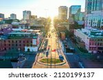 Small photo of Nashville, Tennessee, USA - January 26, 2022: Aerial drone photo of the Nashville, TN, skyline, featuring downtown and Broadway Street at golden hour.