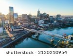 Small photo of Nashville, Tennessee, USA - January 26, 2022: Aerial drone image of the Nashville, TN, skyline featuring the Cumberland River.