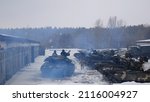 Small photo of Kharkiv, Ukraine - January, 31, 2022: Tanks with tankers turn around and go to the training ground
