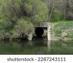 Small photo of Culvert - drain under road. one culvert into the river