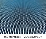 Small photo of Blurred abstract background perforated pattern with moire effect.