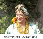 Small photo of San Francisco, CA - Oct 22, 2022: Drag Queen Judge at Senator Scott Wiener's Halloween Pumpkin Carving Event at Noe Courts park.