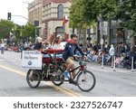 Small photo of Alameda, CA - July 4, 2023: Alameda 4th of July Parade, one of the largest and longest Independence Day parade in the nation. Grand Marshalls Cindy Houts and Alisa Rasera