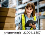 Small photo of Women warehouse worker using digital tablets to check the stock inventory on shelves in large warehouses, a Smart warehouse management system, supply chain and logistic network technology concept
