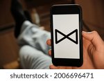 Small photo of Chappy logo of dating application on the screen of mobile phone in males hand, June 2021, San Francisco, USA