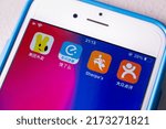 Small photo of Kumamoto, JAPAN - Mar 23 2022 : Popular Chinese online food delivery services Meituan Waimai, Ele.me (ELEME), Sherpa’s and Daojia on an iPhone.