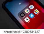 Small photo of Vancouver, CANADA - Apr 19 2023 : ChatGPT, Google, Meta Platform, inc., Amazon Twitter and Microsoft icons seen in an iPhone screen. AI chat bot, deep learning AI race competition rival concept image.