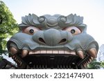 Small photo of Osaka, JAPAN - May 24 2022 : Namba Yasaka Shrine (難波八阪神社, Namba Yasaka Jinja) in sunny day. It is known as the Lion Shrine as it features a ritualistic performance stage in the shape of a lion's head