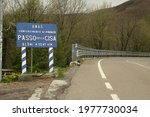 Small photo of Passo della Cisa, Tuscany, Italy. About 05-2021. Strada Statale della Cisa with a warning sign. The ancient road, now supplanted by the highway, was in the past very busy.