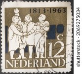 Small photo of The Hague, circa 1963: Postage stamp issued by the Netherlands showing the Triumvirate Van Hogendorp, Limburg Stirum and Duyn v Maasdam on the 150th anniversary.