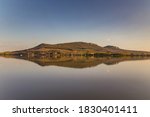 Nové Mlýny Dam with Pálava Hills in the background, reflected on the surface of the lake, South Moravia, Czech Republic