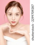 Small photo of Young Asian beauty woman pulled back hair with korean makeup style on face and perfect skin on isolated pink background. Facial treatment, Cosmetology, plastic surgery.