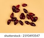 Small photo of Yellow and red Cornelian cherry dogwood or cornus mas beries. Healthy low carb berry. Pulpy, sweet and sour fruit.
