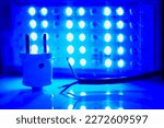Electrical blue equipment connection. Core electric cable and lighting LED lamp                               