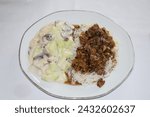 Small photo of gyros with rive and tzatziki cucumber