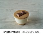                cup of cheese cake with chocolate                 