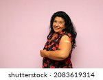 Small photo of Body positive overweight adult laina woman shows her arm recently vaccinated against Covid-19 in the new normal for the Coronavirus pandemic