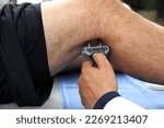 Small photo of Electromyography EMG and Somatosensory Evoked Potential PEV of lower extremities, neurophysiological test applies electrical stimuli near the nerves to explore the rectus femoris muscle